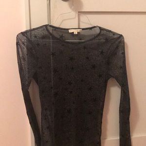 Sheer sparkly long-sleeve shirt with stars